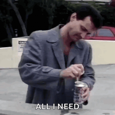 Man In Suit Opening Soda Saying All I Need GIF