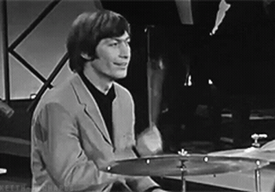 Man In Suit Playing Drums Black And White GIF