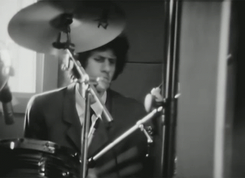 Man In Suit Playing Drums With Sabian Cymbal GIF