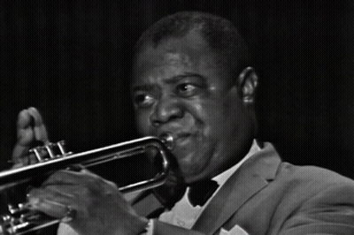 Man In Suit Playing Trumpet GIF