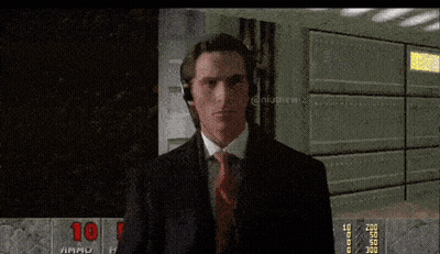Man In Suit Playing Video Game With 10 GIF