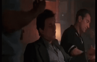 Man In Suit Pointing GIF