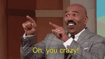 Man In Suit Pointing And Saying Oh You Crazy GIF
