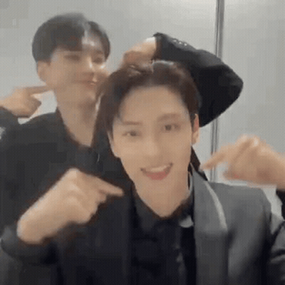 Man In Suit Pointing At Another Man GIF
