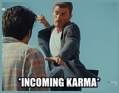 Man In Suit Pointing At Another Man Incoming Karma GIF