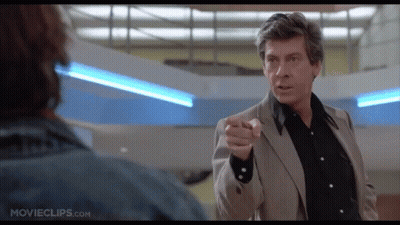 Man In Suit Pointing At Another Man GIF