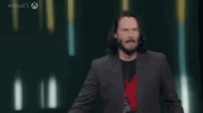 Man In Suit Pointing At Camera Saying Based GIF