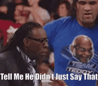 Man In Suit Pointing At Man In Blue Shirt GIF