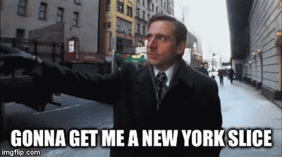 Man In Suit Pointing At New York Slice GIF