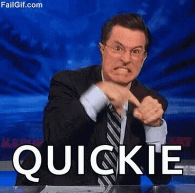 Man In Suit Pointing At Quickie GIF