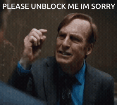 Man In Suit Pointing Gun Saying Please Unblock Me Im Sorry GIF
