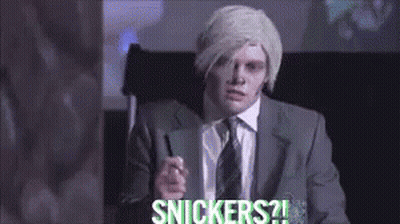 Man In Suit Pointing Saying Snickers GIF