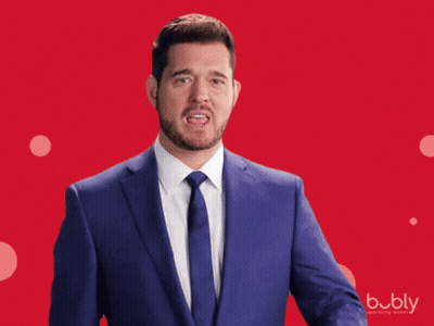 Man In Suit Pointing To Check Mark GIF