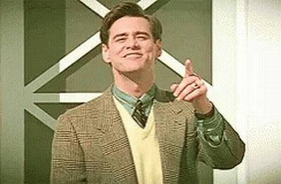 Man In Suit Pointing Up GIF