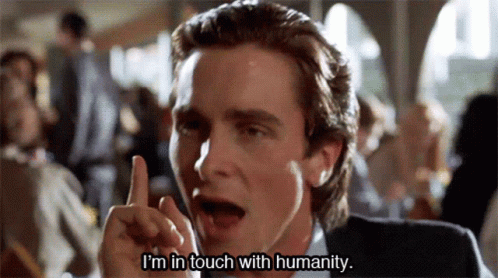 Man In Suit Pointing Up Saying Im In Touch GIF
