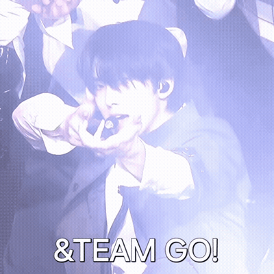 Man in Suit Pointing with Team Go