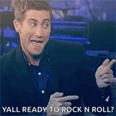 Man In Suit Pointing Yall Ready To Rock N Roll GIF