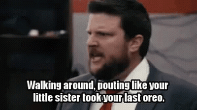 Man In Suit Pouting Like Sister Took Oreos GIF
