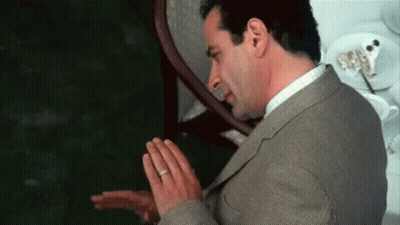 Man In Suit Praying With Folded Hands GIF