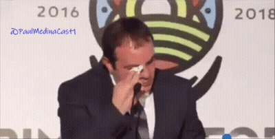 Man In Suit Raising Hands Saying America GIF