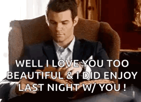 Man In Suit Reading Book Saying I Love You GIF