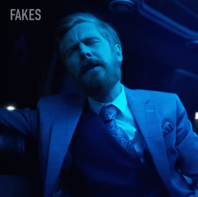 Man In Suit Relax In Dark Room GIF