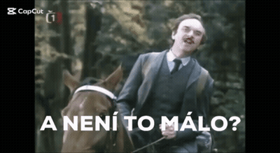 Man In Suit Riding Brown Horse A Není To Malo GIF
