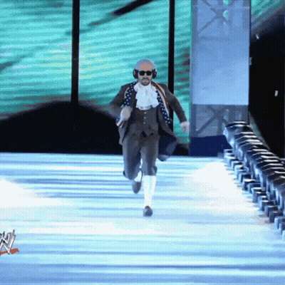 Man In Suit Running Down Runway GIF