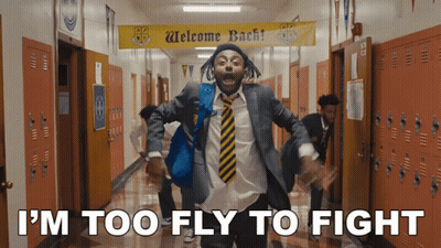 Man In Suit Running Under Welcome Back Sign GIF