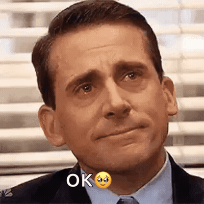 Man In Suit Sad Face Saying Ok GIF