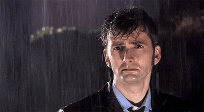 Man In Suit Sad In Rain GIF