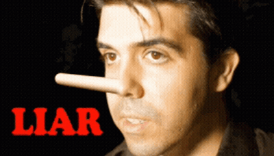 Man In Suit Saying A Liar's A Liar At Table GIF