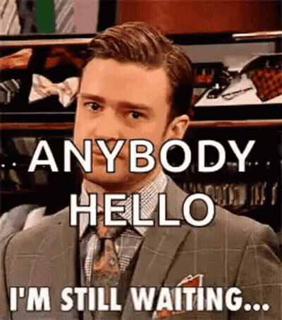 Man In Suit Saying Anybody Hello I'm Still Waiting GIF