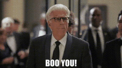 Man In Suit Saying Boo You In Crowd GIF
