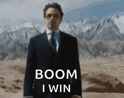 Man In Suit Saying Boom I Win In Desert GIF