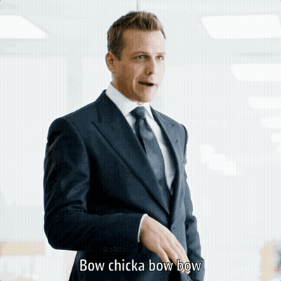 Man In Suit Saying Bow Chicka Bow Bow GIF