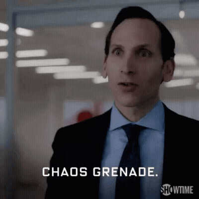 Man In Suit Saying Chaos Grenade GIF