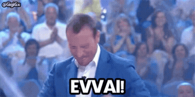 Man In Suit Saying Evvai To Crowd GIF