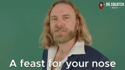Man In Suit Saying Feast For Your Nose GIF