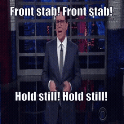 Man In Suit Saying Front Stab GIF