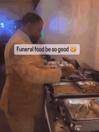Man In Suit Saying Funeral Food Be So Good GIF