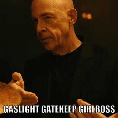 Man In Suit Saying Gaslight Gatekeep Girlboss GIF