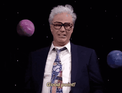 Man In Suit Saying Good Point In Front Of Planets GIF