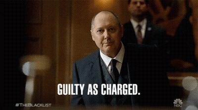 Man In Suit Saying Guilty As Charged GIF