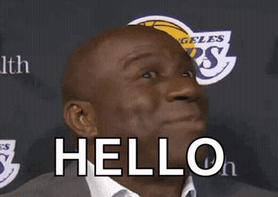 Man In Suit Saying Hello GIF