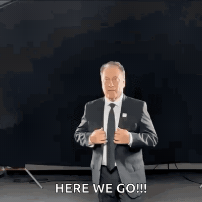 Man In Suit Saying Here We Go GIF