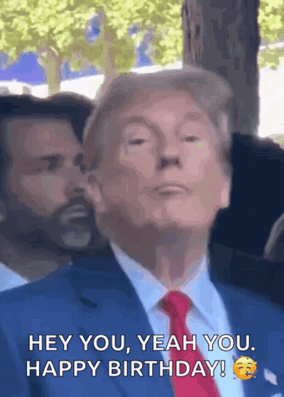 Man In Suit Saying Hey You Happy Birthday GIF