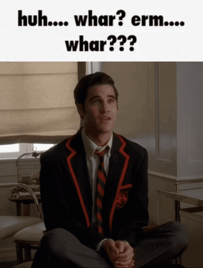 Man In Suit Saying Huh Whar Erm GIF
