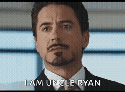 Man In Suit Saying I Am Uncle Ryan GIF
