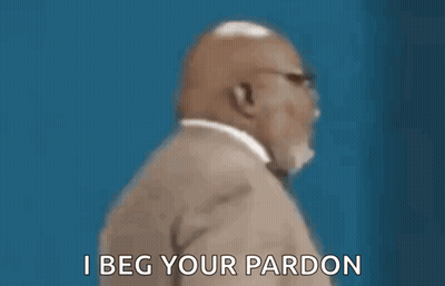 Man In Suit Saying I Beg Your Pardon GIF